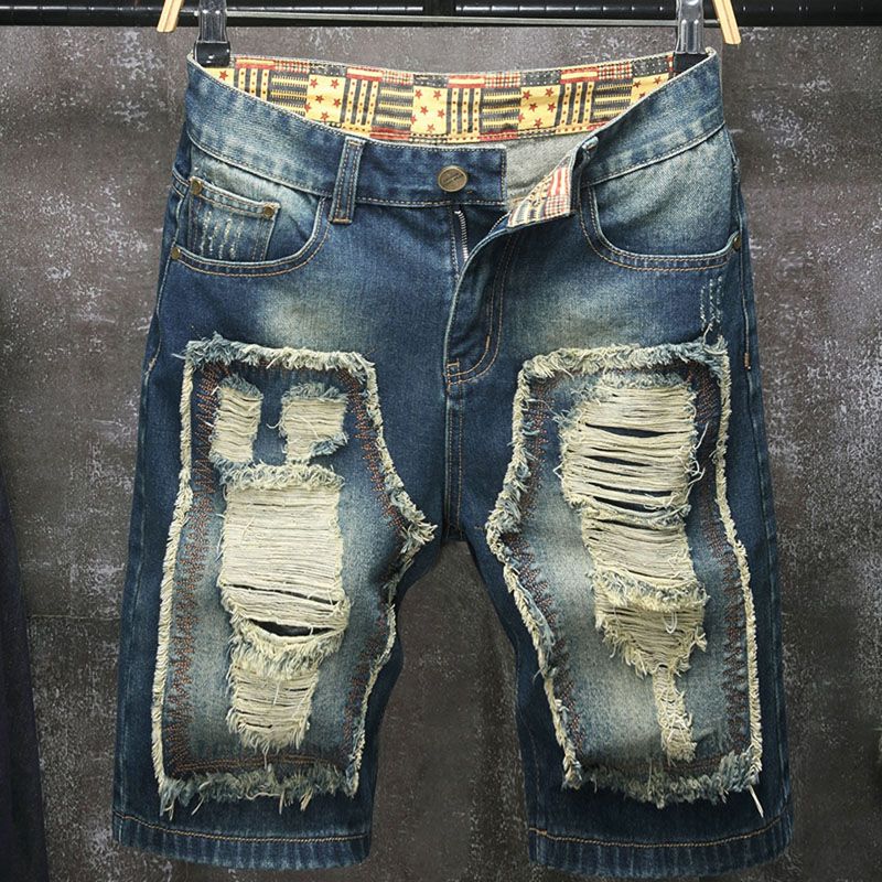 Embroidery On Jeans - กางเกงยีนส์ขาสั้นผู้ชายสไตล์ยุโรปและอเมริกาแบบใหม่ แต่งลายปักขาดๆ ขนาด 5 นิ้ว ทรงหลวมสบาย